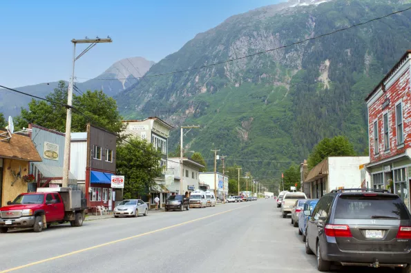 image of a street with mountains in the background
